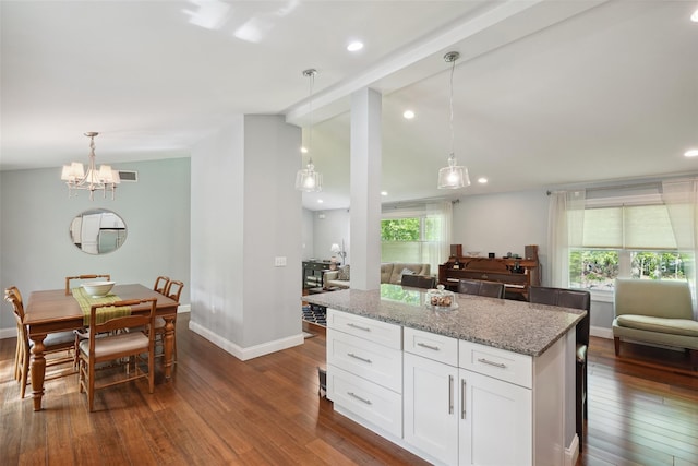 17 Kingswood Way, South Salem, NY 10590 - kitchen featuring baseboards, dark wood-type flooring, white cabinetry, light stone counters, and a chandelier