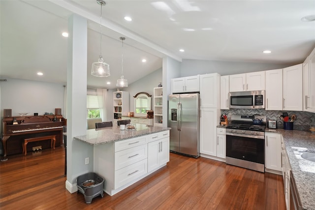 17 Kingswood Way, South Salem, NY 10590 - kitchen featuring appliances with stainless steel finishes, dark wood finished floors, backsplash, light stone countertops, and white cabinetry