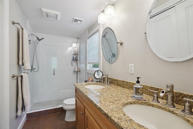 17 Kingswood Way, South Salem, NY 10590 - full bath featuring a shower stall, toilet, tile patterned floors, and double vanity