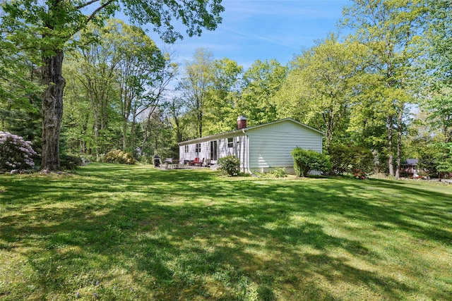 17 Kingswood Way, South Salem, NY 10590 - view of grassy yard featuring a patio