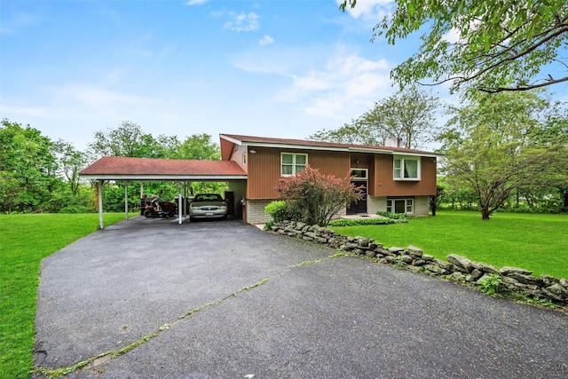 411 Prospect Rd, Chester, NY 10918 - raised ranch with brick siding, asphalt driveway, a front lawn, and a chimney