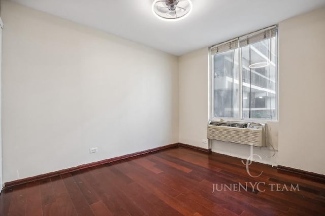 150-38 Union Tpke Unit 4K, Flushing, NY 11367 - unfurnished room featuring baseboards and dark wood-style floors