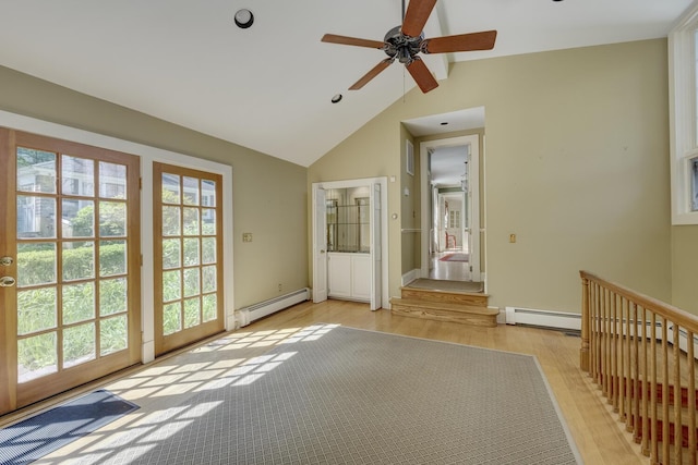 entryway with baseboard heating, plenty of natural light, light wood-style flooring, and ceiling fan
