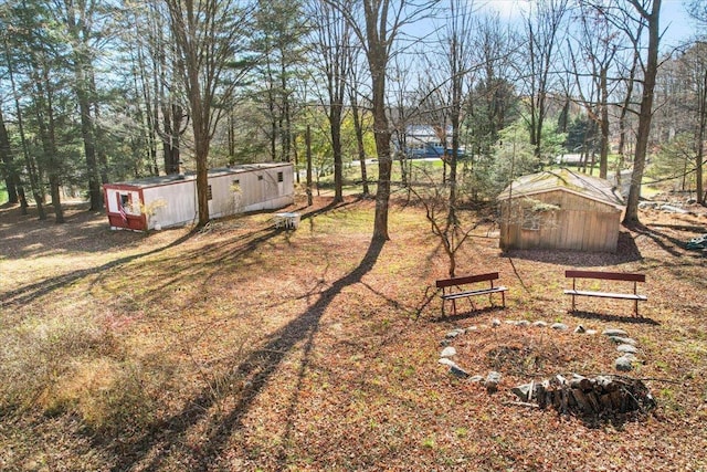 553 Roosa Gap Rd, Bloomingburg, NY 12721 - view of yard featuring a storage shed and an outdoor structure