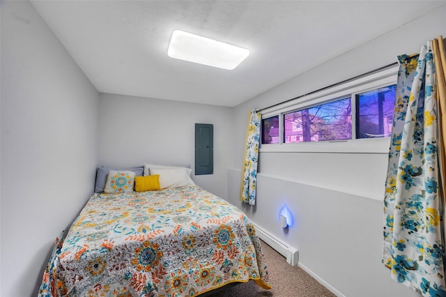 carpeted bedroom with baseboard heating, electric panel, and baseboards
