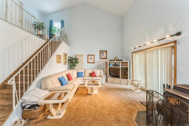 17 Bayview Ct, Inwood, NY 11096 - living area with high vaulted ceiling, carpet, and stairway