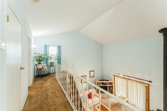 17 Bayview Ct, Inwood, NY 11096 - hall featuring an upstairs landing, lofted ceiling, and carpet flooring