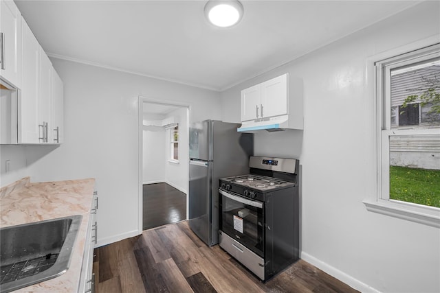 13 Barnett Rd E, Monroe, NY 10950 - kitchen featuring stainless steel appliances, white cabinetry, dark wood-type flooring, baseboards, and light countertops