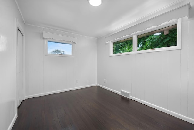 13 Barnett Rd E, Monroe, NY 10950 - unfurnished room featuring dark wood-style floors, ornamental molding, and baseboards