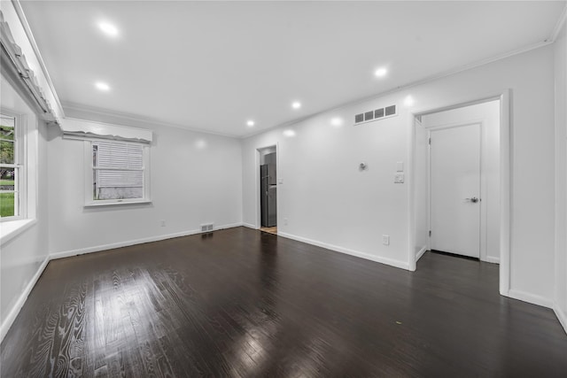 13 Barnett Rd E, Monroe, NY 10950 - unfurnished living room with dark wood-style flooring, ornamental molding, baseboards, and recessed lighting