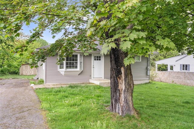 13 Barnett Rd E, Monroe, NY 10950 - view of front facade with an outbuilding and a storage shed