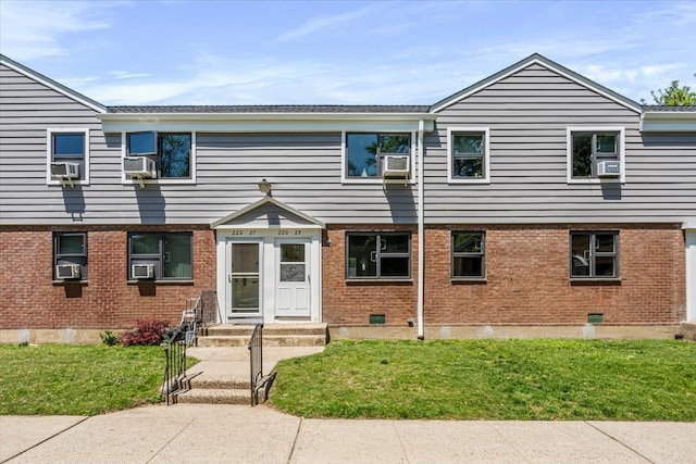 220-29 73rd Ave Lower, Lower, Oakland Gardens, NY 11364 - multi unit property with a front yard, brick siding, and cooling unit
