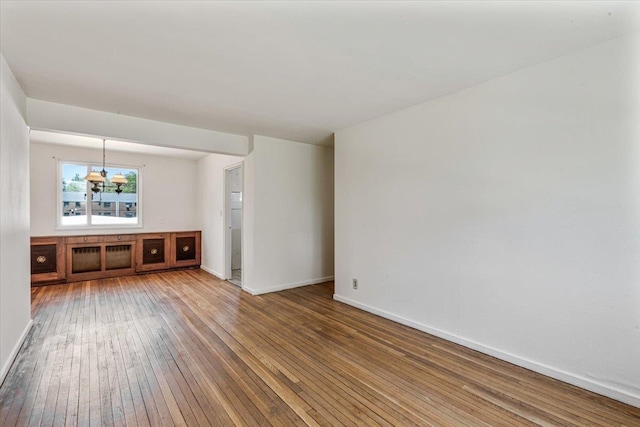 220-29 73rd Ave Lower, Lower, Oakland Gardens, NY 11364 - spare room featuring hardwood / wood-style floors and baseboards