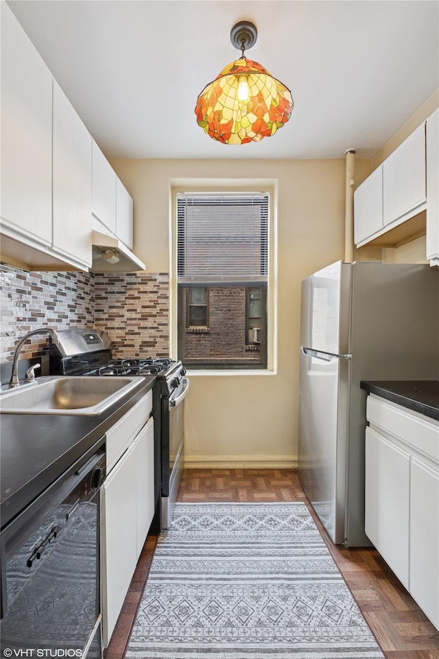 98-50 67th Ave Unit 6F, Rego Park, NY 11365 - kitchen featuring stainless steel appliances, under cabinet range hood, and white cabinetry