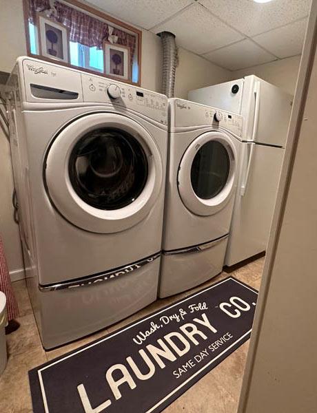 laundry room with washer and dryer