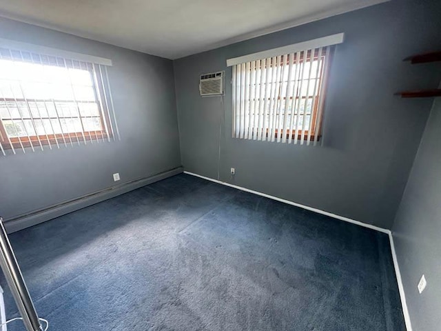 899 E Meadow Ave, North Bellmore, NY 11710 - carpeted spare room with healthy amount of natural light, a wall mounted AC, baseboards, and a baseboard radiator