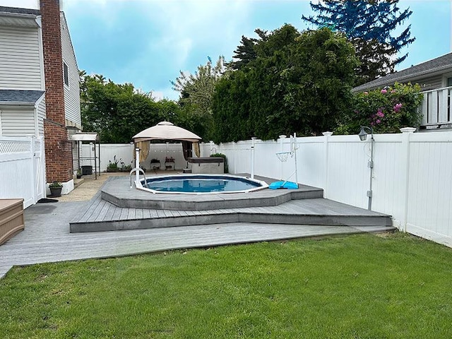 899 E Meadow Ave, North Bellmore, NY 11710 - view of pool featuring a gazebo, a wooden deck, and a covered hot tub