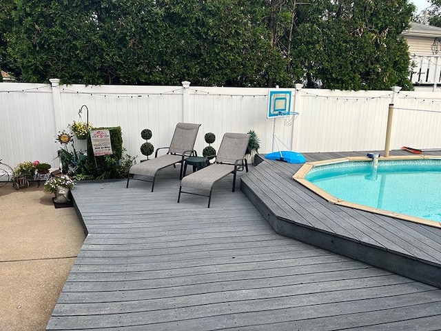 899 E Meadow Ave, North Bellmore, NY 11710 - view of pool featuring a wooden deck and a fenced backyard