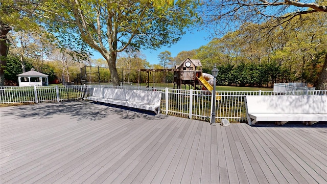 124 Montauk Hwy, Westhampton, NY 11977 - deck featuring a playground and fence