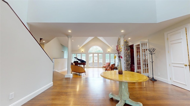124 Montauk Hwy, Westhampton, NY 11977 - foyer entrance featuring wood finished floors, baseboards, lofted ceiling, and recessed lighting
