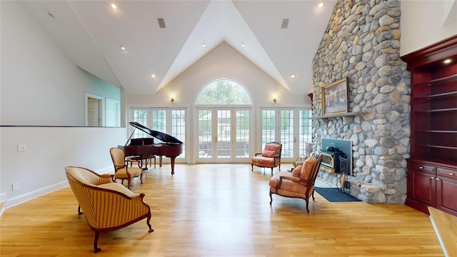 124 Montauk Hwy, Westhampton, NY 11977 - living area featuring light wood-style floors and vaulted ceiling