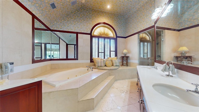 124 Montauk Hwy, Westhampton, NY 11977 - bathroom featuring a shower stall, a whirlpool tub, double vanity, tile walls, and tile patterned floors
