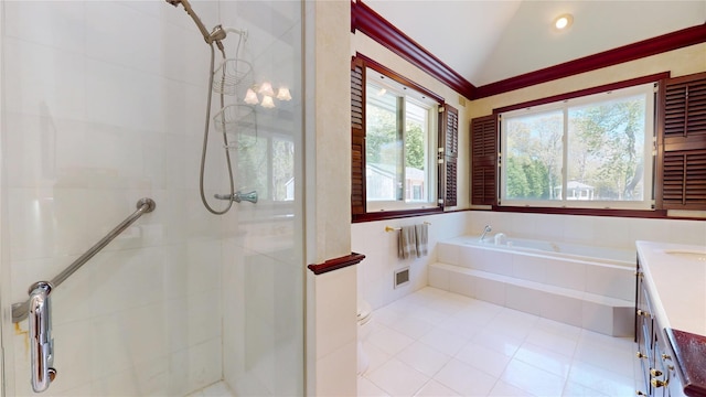 124 Montauk Hwy, Westhampton, NY 11977 - full bath featuring vanity, a stall shower, vaulted ceiling, a bath, and tile patterned flooring