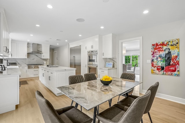 92 Random Farms Dr, Chappaqua, NY 10514 - dining space with light wood-style flooring, recessed lighting, and baseboards