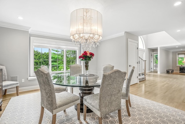 92 Random Farms Dr, Chappaqua, NY 10514 - dining area featuring stairway, crown molding, light wood-type flooring, baseboards, and a chandelier