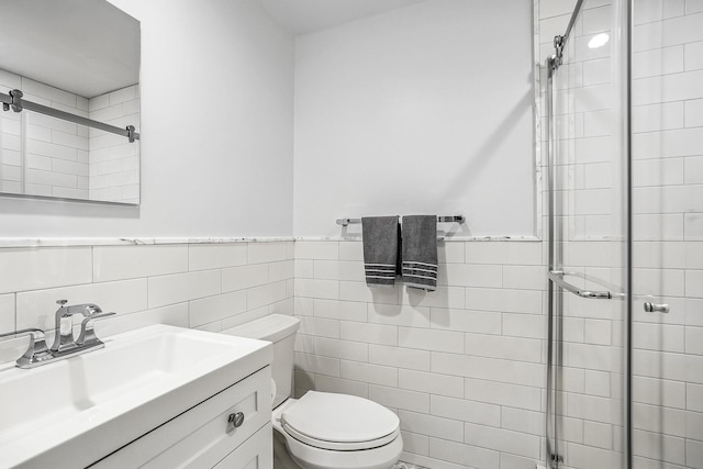 92 Random Farms Dr, Chappaqua, NY 10514 - full bathroom featuring tile walls, a shower stall, toilet, vanity, and wainscoting