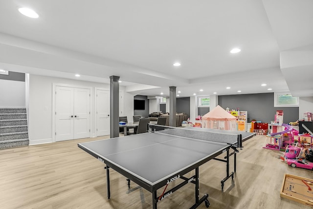 92 Random Farms Dr, Chappaqua, NY 10514 - playroom with light wood finished floors, recessed lighting, and baseboards