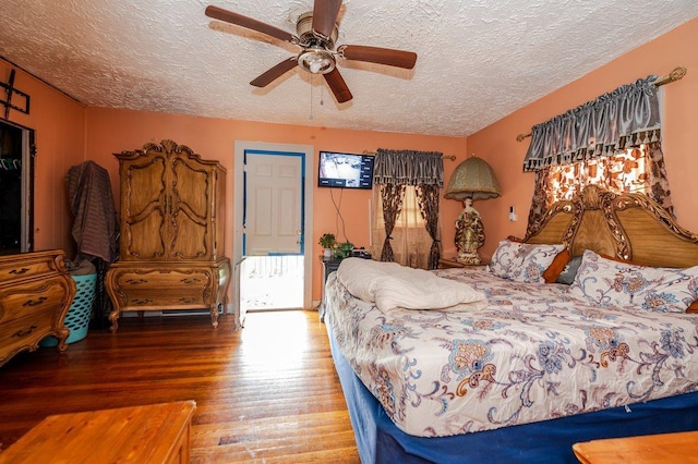 31 Thurman St, Yonkers, NY 10701 - bedroom featuring a textured ceiling, wood finished floors, and a ceiling fan