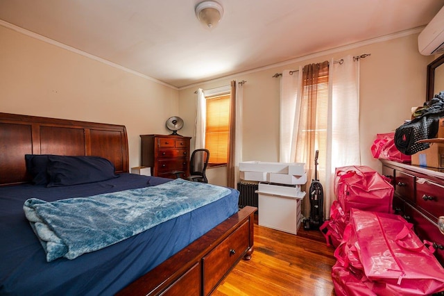 31 Thurman St, Yonkers, NY 10701 - bedroom featuring a wall mounted air conditioner, wood finished floors, and crown molding