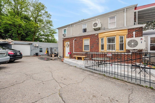 31 Thurman St, Yonkers, NY 10701 - view of front of house featuring brick siding and a cooling unit