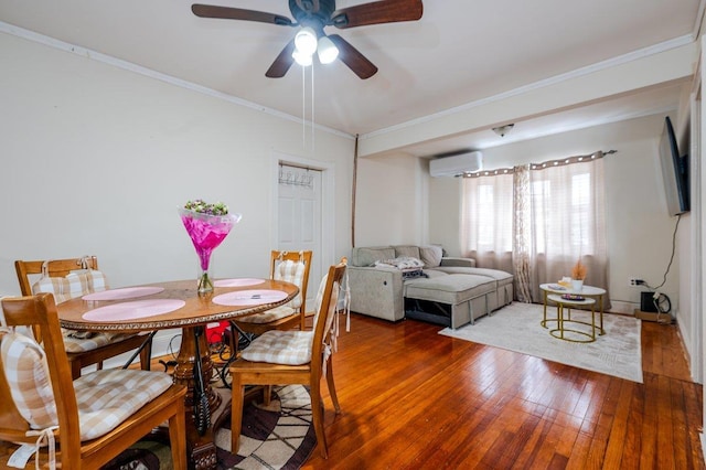 31 Thurman St, Yonkers, NY 10701 - dining area with a wall unit AC, hardwood / wood-style floors, ornamental molding, and a ceiling fan