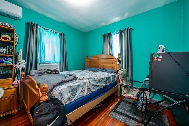 31 Thurman St, Yonkers, NY 10701 - bedroom with an AC wall unit and wood finished floors