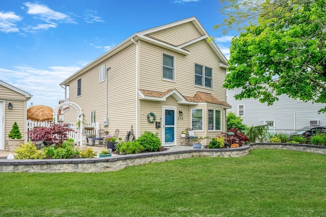 510 Fire Island Ave, Babylon, NY 11702 - view of front of home featuring a front lawn and a patio