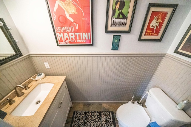 510 Fire Island Ave, Babylon, NY 11702 - half bath with wainscoting, toilet, and vanity