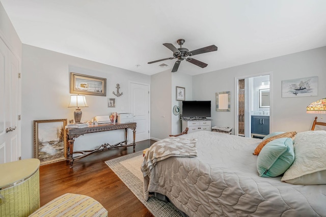 510 Fire Island Ave, Babylon, NY 11702 - bedroom featuring wood finished floors, a ceiling fan, ensuite bath, and a sink