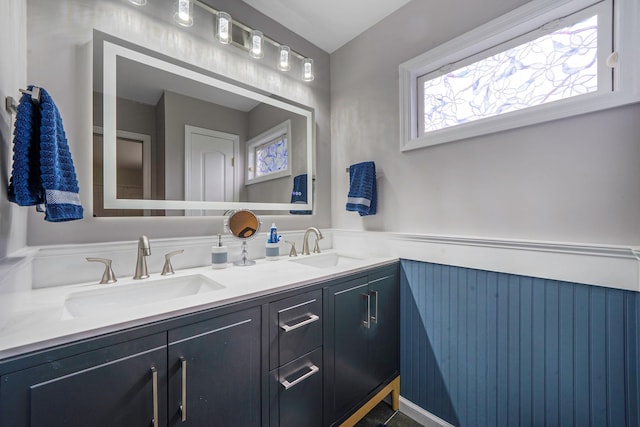 510 Fire Island Ave, Babylon, NY 11702 - bathroom with wainscoting and double vanity