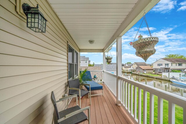510 Fire Island Ave, Babylon, NY 11702 - wooden terrace with a water view and a residential view