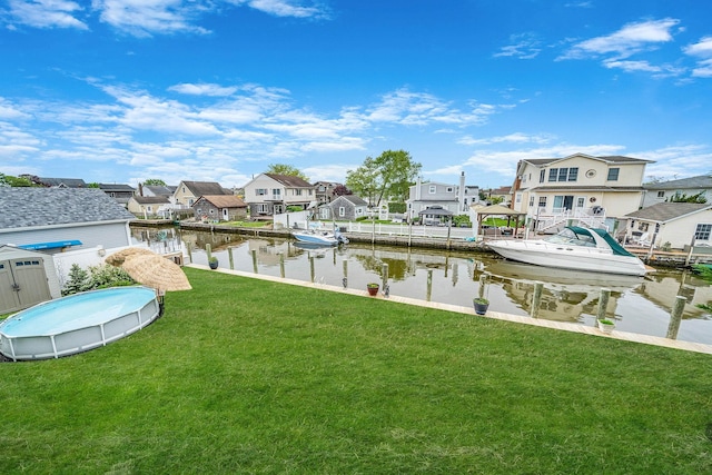 510 Fire Island Ave, Babylon, NY 11702 - dock featuring a residential view, boat lift, a yard, and a water view