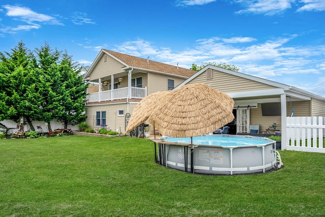 510 Fire Island Ave, Babylon, NY 11702 - back of property featuring an outdoor pool, stairway, and a ceiling fan