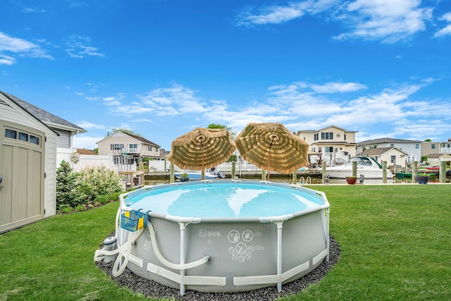 510 Fire Island Ave, Babylon, NY 11702 - view of swimming pool with a yard and a residential view