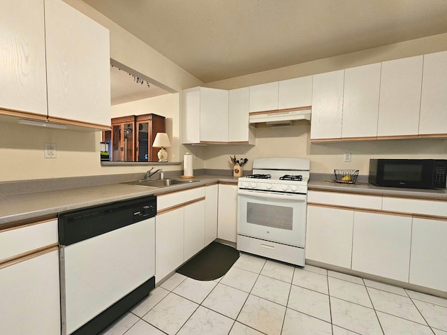 53 Olde Wagon Rd Unit 53, Warwick, NY 10990 - kitchen with white appliances, under cabinet range hood, a sink, white cabinetry, and light countertops