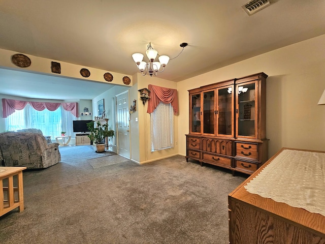 53 Olde Wagon Rd Unit 53, Warwick, NY 10990 - carpeted dining room featuring a chandelier and baseboards