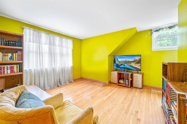 121-32 234th St, Laurelton, NY 11422 - living area featuring hardwood / wood-style flooring and baseboards