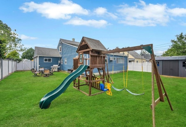 91 Valley Rd, Levittown, NY 11756 - view of playground featuring an outbuilding and a storage unit