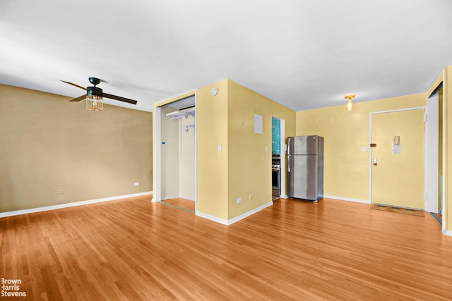 2015 Saint Paul Ave Unit 3H, Bronx, NY 10461 - unfurnished living room featuring light wood finished floors, a ceiling fan, and baseboards