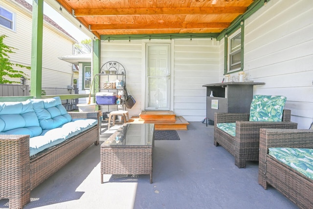 186-16 104th Ave, Saint Albans, NY 11412 - sunroom featuring an outdoor living space and beam ceiling